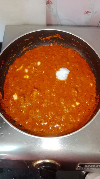 Step 2.2: Add crushed garlic pods with salt and cook the gravy until oil separates
