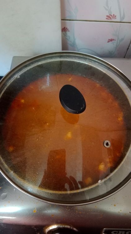 Step 2.2: Add water to the mixie jar and pour it into the pan