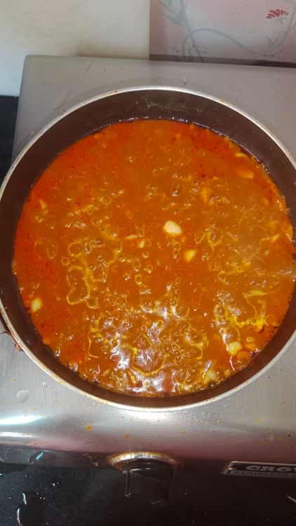 Step 2.1: Add fish pieces, cover, and cook for 2-3 minutes