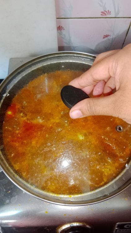 Step 2.3: Add fish pieces, cover, and cook for 2-3 minutes
