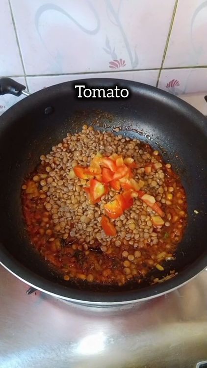Step 1.2: Add soaked masoor, Add tomato and cook till it softens