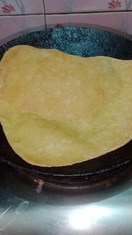 Step 3.1: Roast one side until small bubbles appear, then flip and cook the other side