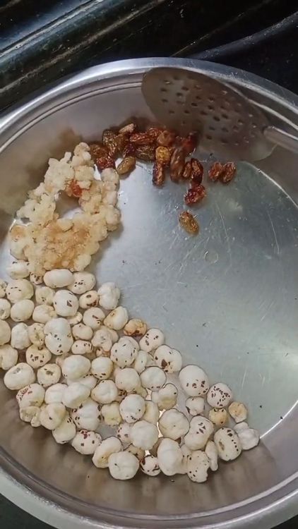 Step 1.2: Add lotus seeds to the pan and dry roast for 2-3 minutes