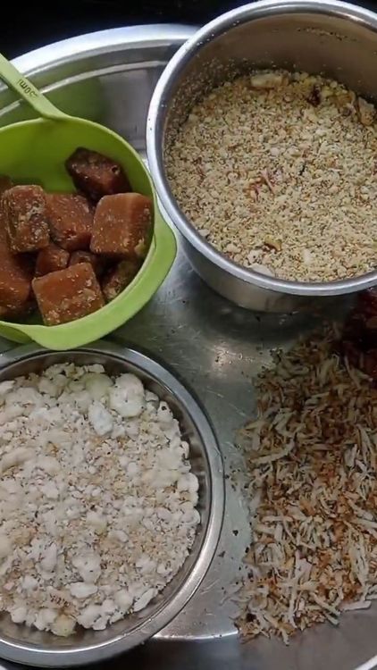Step 1.3: Add shredded dry coconut to the pan and roast until it turns translucent