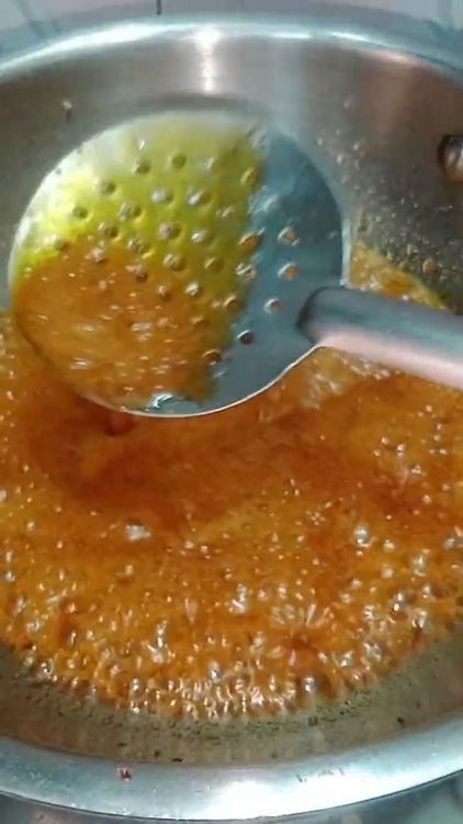 Step 3.2: In the same pan, add jaggery and water