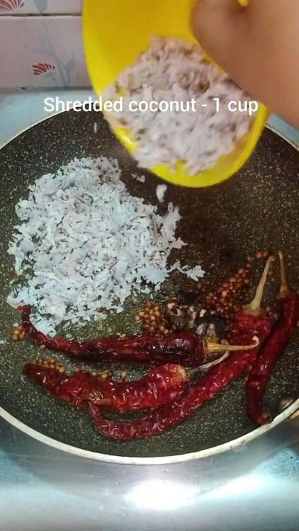 Step 2.1: Turn off the flame and add 1 cup of shredded coconut