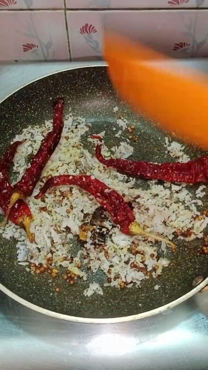 Step 2.2: Turn off the flame and add 1 cup of shredded coconut