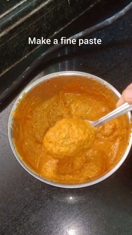 Step 2.2: Make a fine paste by adding 1/2 cup water to the cooled roasted ingredients
