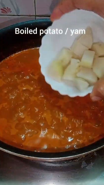 Step 2.3: When sprouts softens a bit , add the masala paste and boiled yam and give it a boil for 10 min