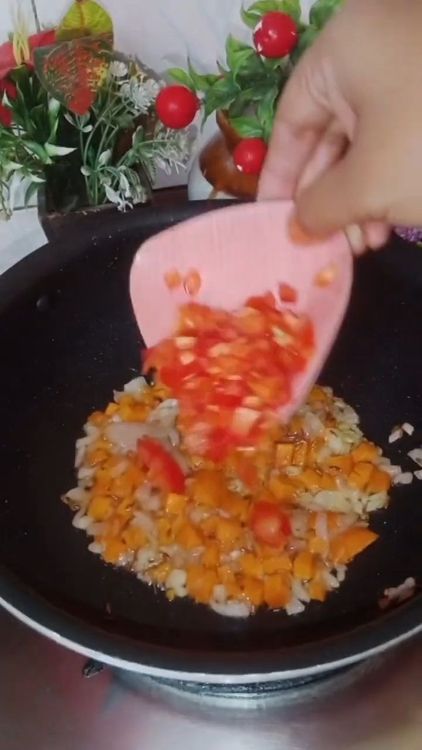 Step 2.2: Add tomato and carrot, and sauté for 2 minutes