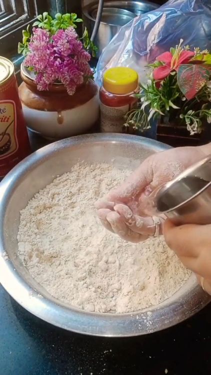 Step 1.1: Add water gradually and knead into a smooth, soft dough