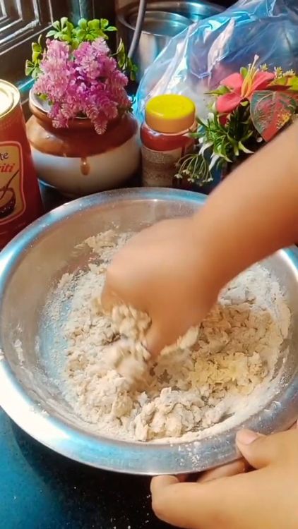 Step 1.2: Add water gradually and knead into a smooth, soft dough