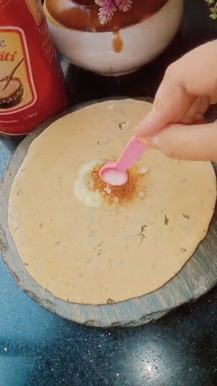 Step 2.2: Roll out one ball into a thin circle