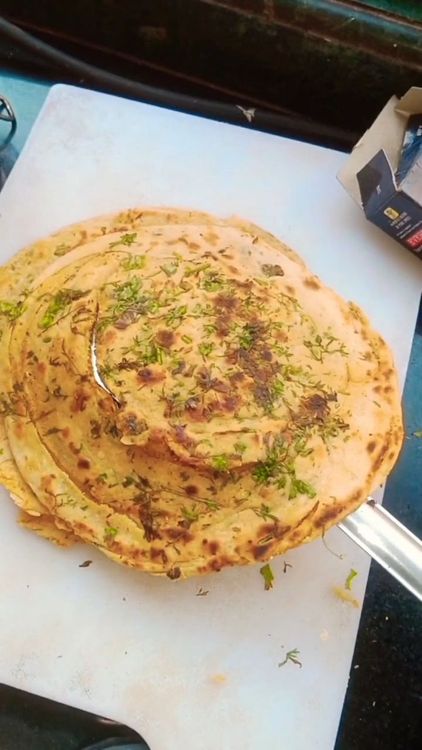 Step 3.1: Gently crumble the laccha paratha with your palms before serving