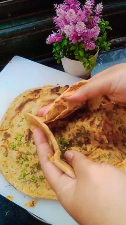 Step 3.2: Gently crumble the laccha paratha with your palms before serving