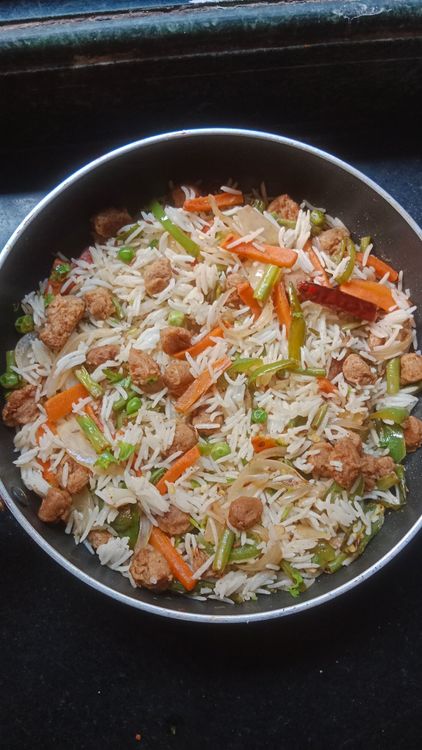 Step 4.2: Add the cooked rice and chopped coriander leaves to the vegetable mixture