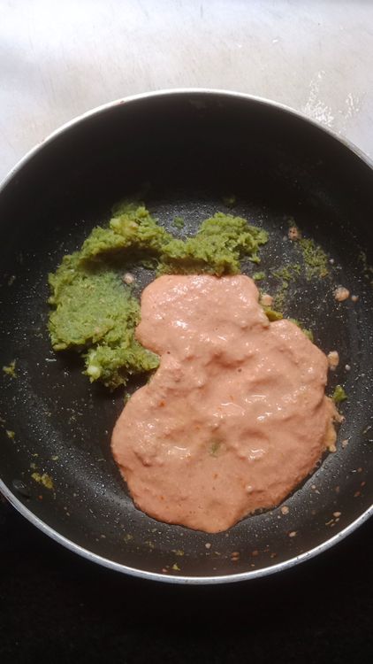 Step 2.2: Grind tomato and soaked cashews into a fine paste and add it to the cooked onion paste