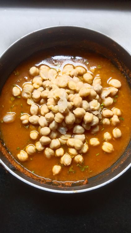 Step 2.1: Add chopped coriander leaves and boiled chickpeas