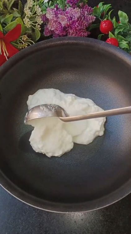 Step 1.1: In a bowl, add 4 cups of homemade thick curd and 2 cups of water