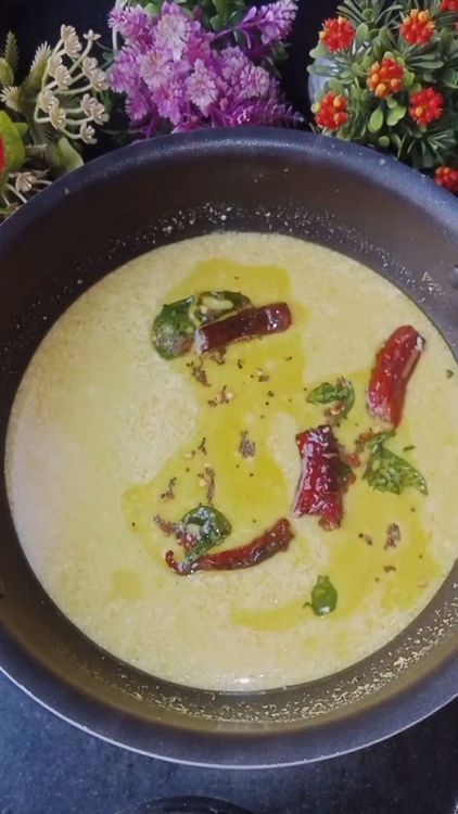 Step 2.1: Pour the tempering over the prepared curd rasam
