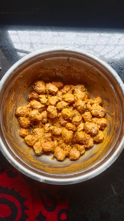 Step 1.2: Marinate the soya chunks with curd, turmeric powder, kashmiri red chilli powder, coriander cumin powder, pav bhaji masala, and salt