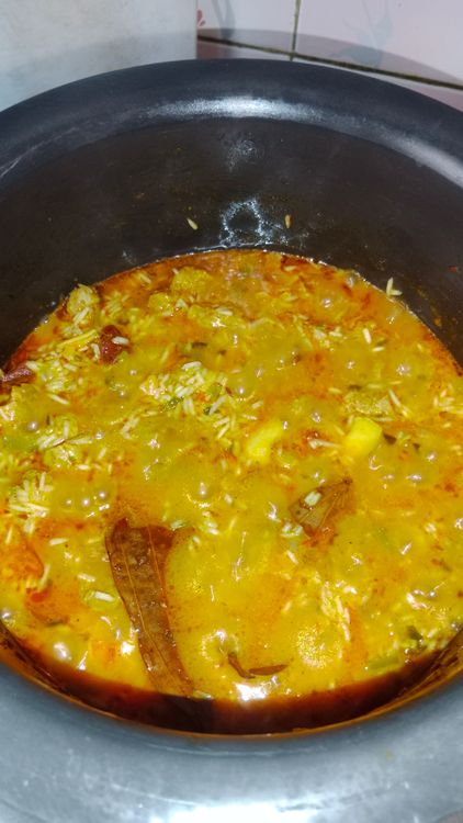 Step 2.1: Cover and simmer on low flame for 8-10 minutes