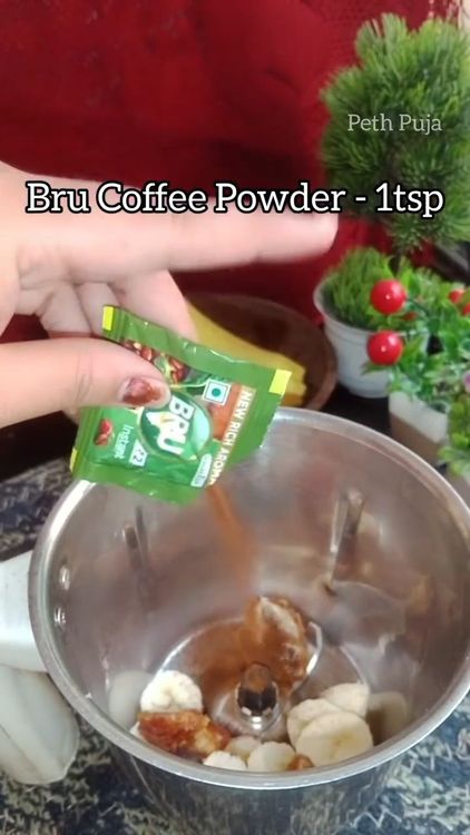 Step 1.3: Add the chopped banana, seedless red dates, instant coffee powder, butter unsalted  and chilled toned milk to a blender