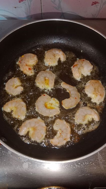 Step 2.1: In a pan , heat butter and add marinated prawns one by one