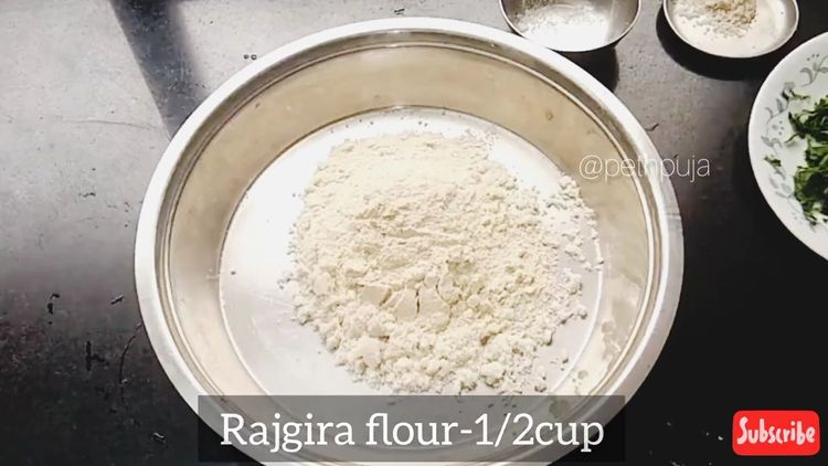 Step 1.1: In a kneading plate or parat, combine the makhana flour, rajgira atta, coriander leaves, cumin powder, green chillies, grated dudhi, and senda namak