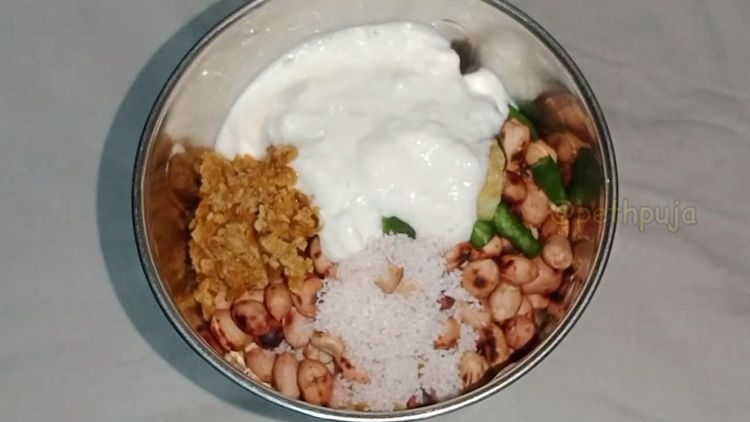 Step 1.1: Add the roasted sesame seeds, peanuts, curd, green chilies, ginger, and senda namak to a mixer jar