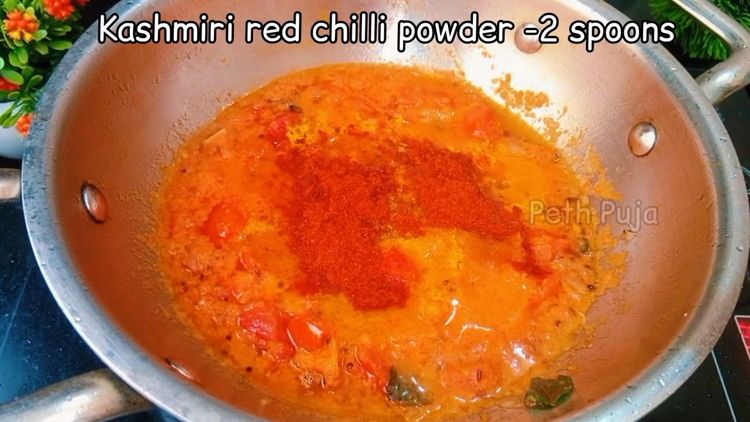 Step 1.2: Add the roughly chopped tomato and tomato puree