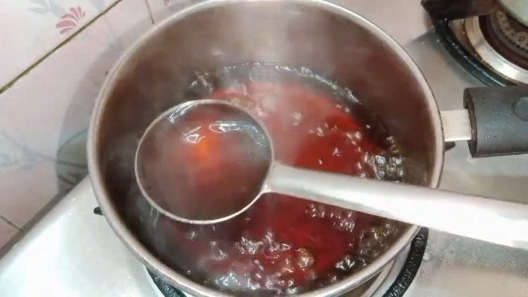 Step 1.2: In a pan, cook jaggery with water until it dissolves completely and becomes thick