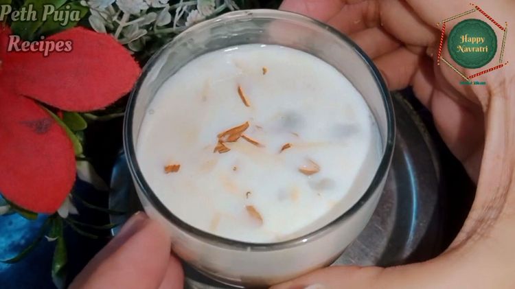 Step 1.2: Serve with ice cubes and garnish with almond flakes