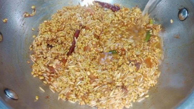 Step 3.2: Once tomato softens add roasted dal rice 