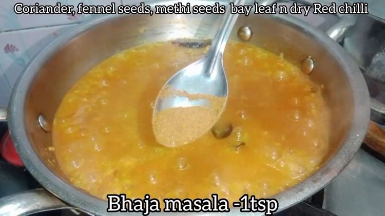 Step 3.2: Pour in 4 cups of water, add a pinch of sugar, curry leaves, and bhaja masala
