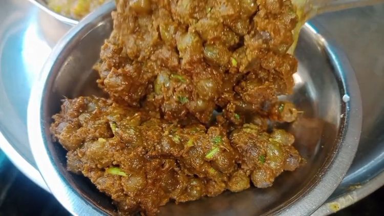 Step 2.1: Garnish with coriander leaves and serve hot with roti, puris, or jeera rice