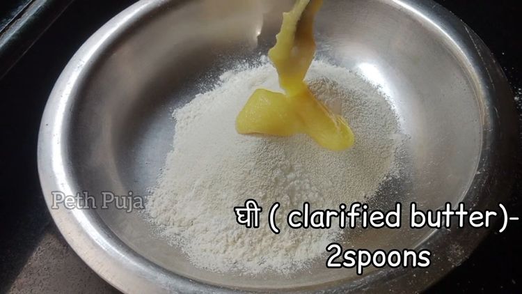 Step 1.1: Mix maida, salt, baking powder, suji, 1 spoon ghee till the mixture holds on your fist