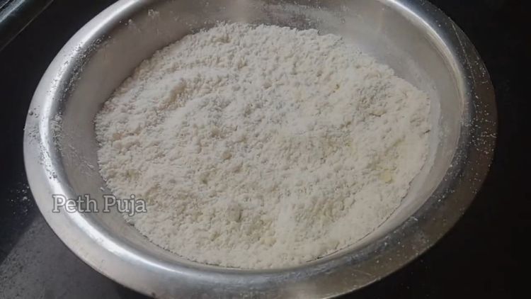 Step 1.2: Mix maida, salt, baking powder, suji, 1 spoon ghee till the mixture holds on your fist