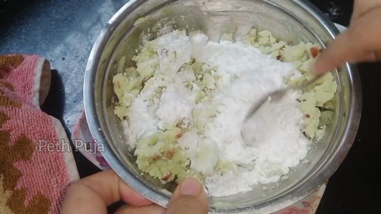 Step 3.2: When khoya cools down , add chopped dry fruits and cardamom-infused sugar