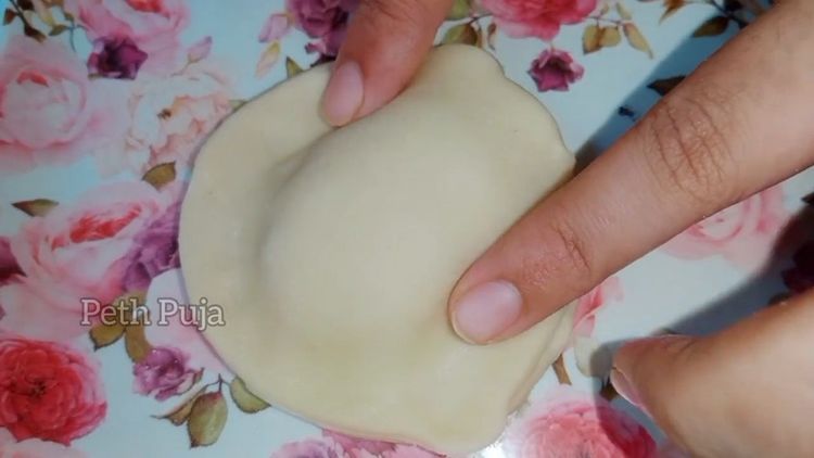 Step 4.3: Roll the dough into puri-shaped discs