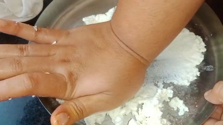 Step 1.1: Gently mash the paneer with your palms till it becomes soft, smooth, and pliable