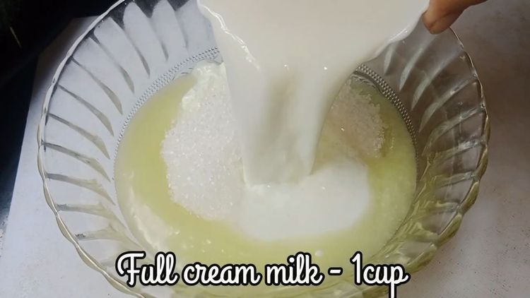 Step 1.1: In a bowl, whisk together ghee, curd, sugar, and full cream milk until well combined