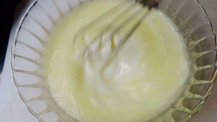 Step 1.2: In a bowl, whisk together ghee, curd, sugar, and full cream milk until well combined