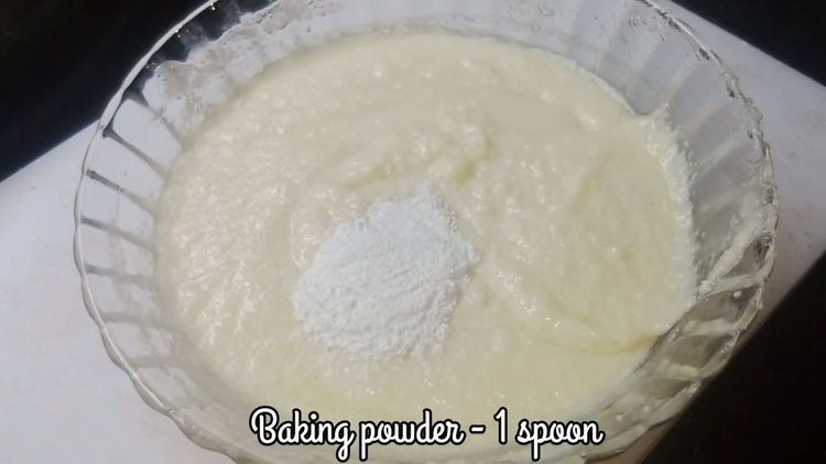 Step 1.1: Once the rava has soaked well, add baking powder to the batter and mix thoroughly