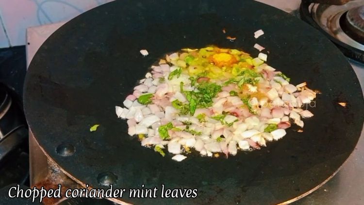 Step 2.1: Heat oil or ghee on a dosa tawa and crackle mustard seeds