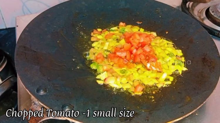 Step 2.2: Heat oil or ghee on a dosa tawa and crackle mustard seeds