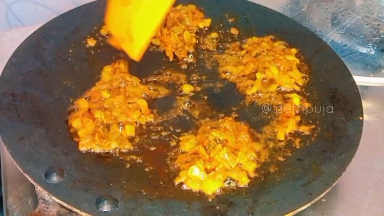 Step 2.1: Add chopped tomato, red chilli powder, turmeric powder, kitchen king masala, pinch of salt and a tablespoon of water to avoid burning the spices