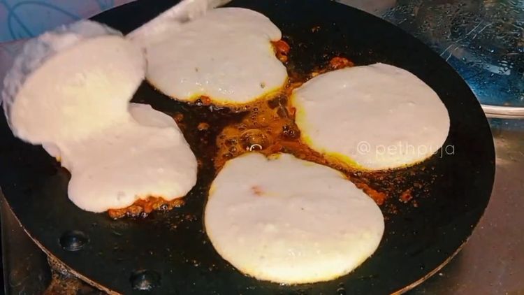 Step 2.2: Add chopped tomato, red chilli powder, turmeric powder, kitchen king masala, pinch of salt and a tablespoon of water to avoid burning the spices