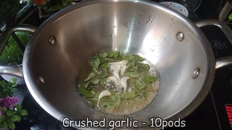 Step 2.1: Heat oil in a pan and add mustard seeds, few curry leaves and crushed garlic