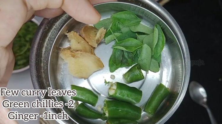 Step 1.1: Add ginger, green chillies, and curry leaves to the grinder and grind again